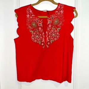 Bright red blouse with beading detail
